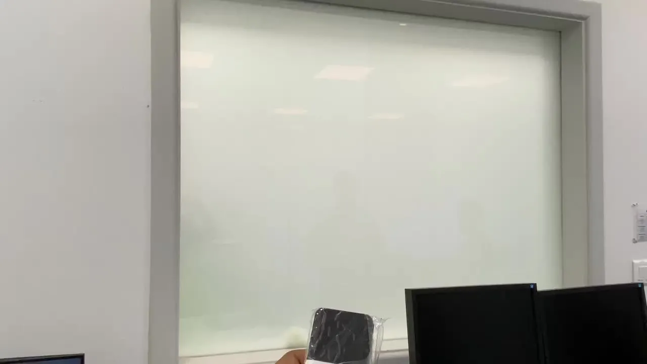 Switchable glass partition in an office